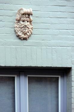 Iconographie - Brugge - Tête sculptée en façade d'une maison
