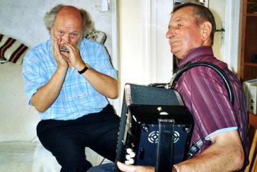 Iconographie - Eugène Ferré, accordéoniste amateur, et un joueur d'harmonica