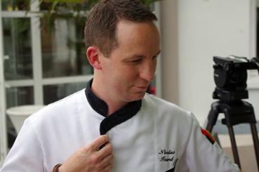 Iconographie - Le chef de cuisine du restaurant Le Robinson