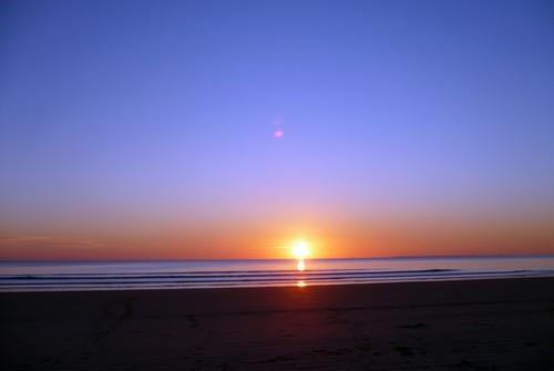 Iconographie - Coucher de soleil sur la plage