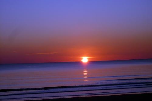 Iconographie - Coucher de soleil sur la plage