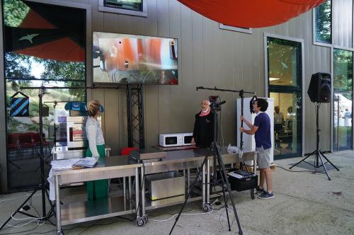 Iconographie - Installation de la cuisine pour la démonstration par les chefs lors de la Grande Fête