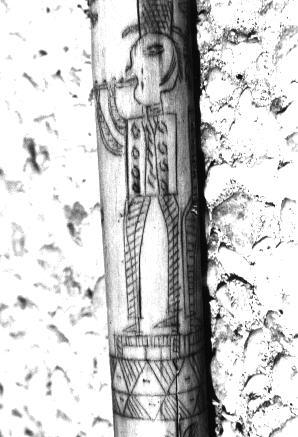 Iconographie - Joueur de flûte incisé par Henri Grondin sur un bâton de lit