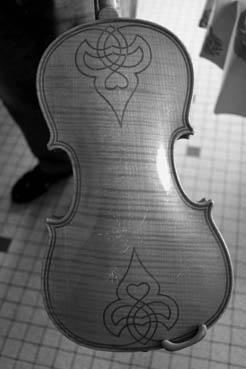 Iconographie - Détail d'un violon