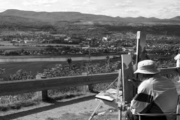 Iconographie - Baie-Saint-Paul - Peintre au-dessus de la baie